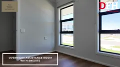 OOA bedroom with window and split-system unit