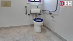Toilet and support rails in participant ensuite two