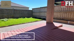 Rear lawn beside the alfresco deck